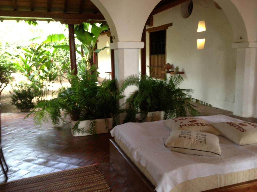 Hotel Portal de la Marquesa Mompox Exterior foto A bedroom at the hotel